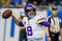 FILE - Minnesota Vikings' Kirk Cousins throws during the first half of an NFL football game aga ...