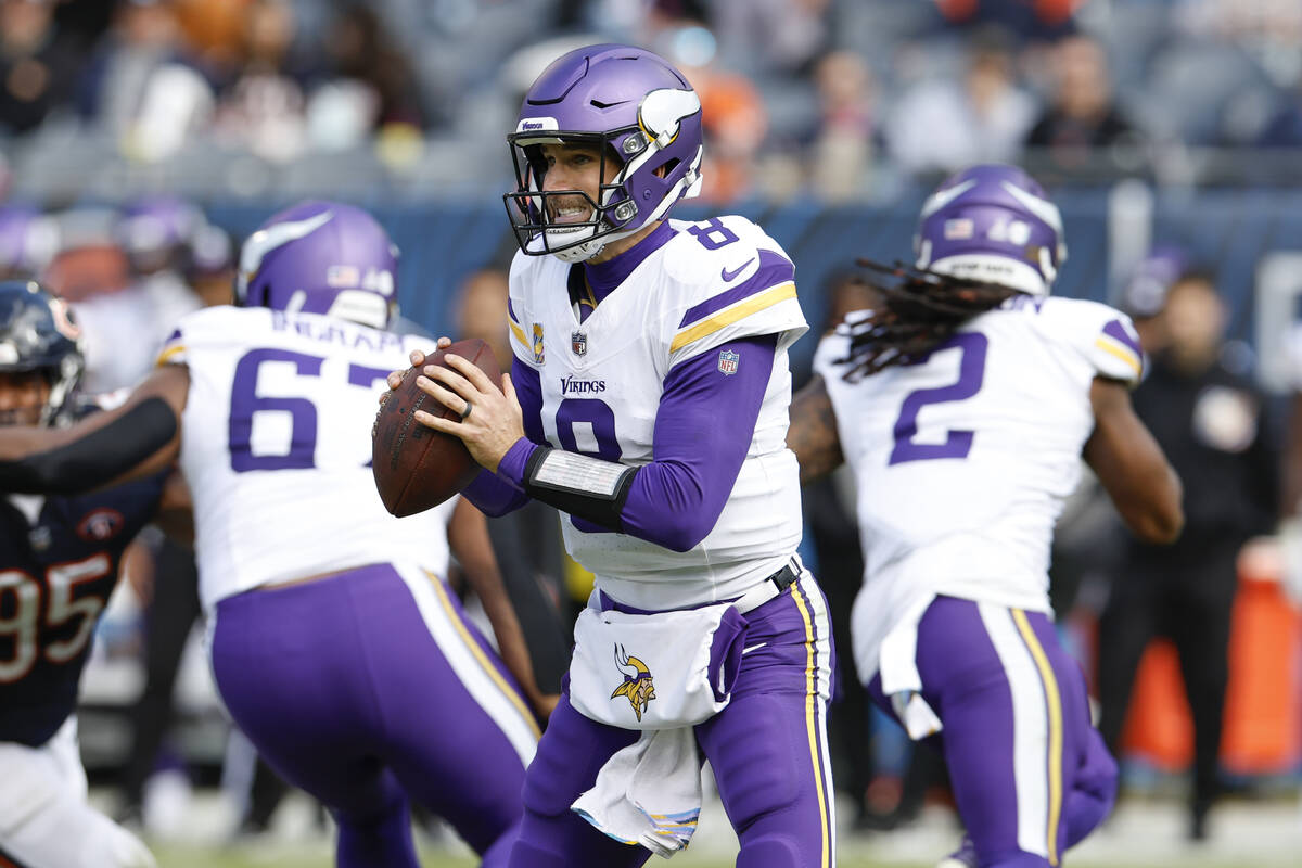Minnesota Vikings quarterback Kirk Cousins (8) looks to pass the ball during the second half of ...