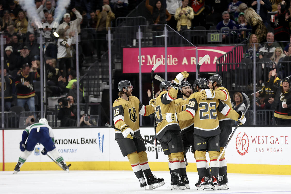 The Golden Knights celebrate after right wing Michael Amadio (22) scored during the second peri ...