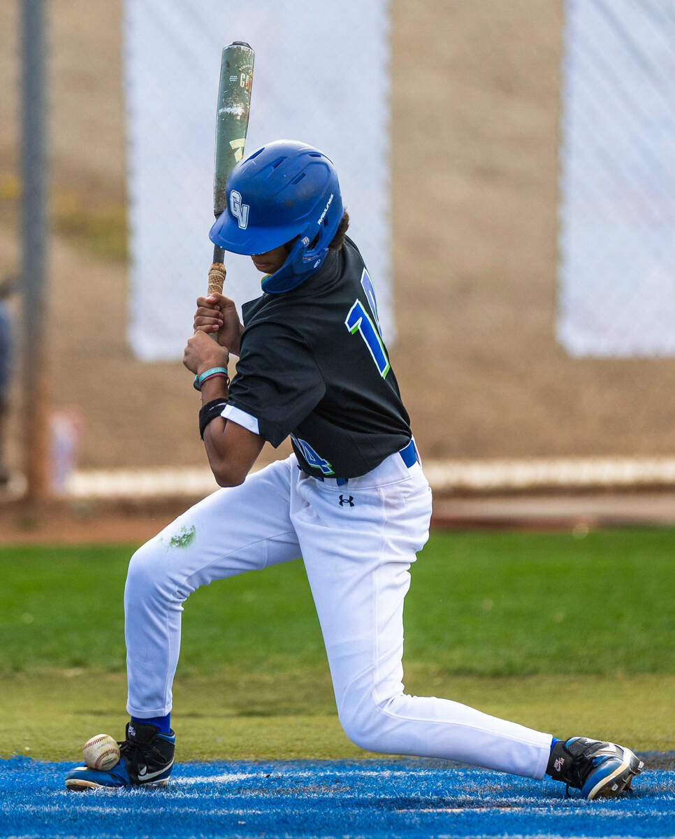 Green Valley batter Isaiah Alba (14) takes a ball off his foot after his leg for a walk against ...
