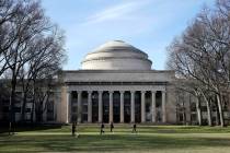 FILE - Students walk past the "Great Dome" atop Building 10 on the Massachusetts Inst ...
