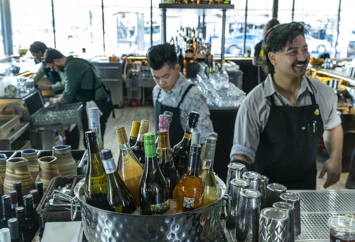 Esther's Kitchen bar staff stock up for their first guests as they prepare to reopen in their n ...