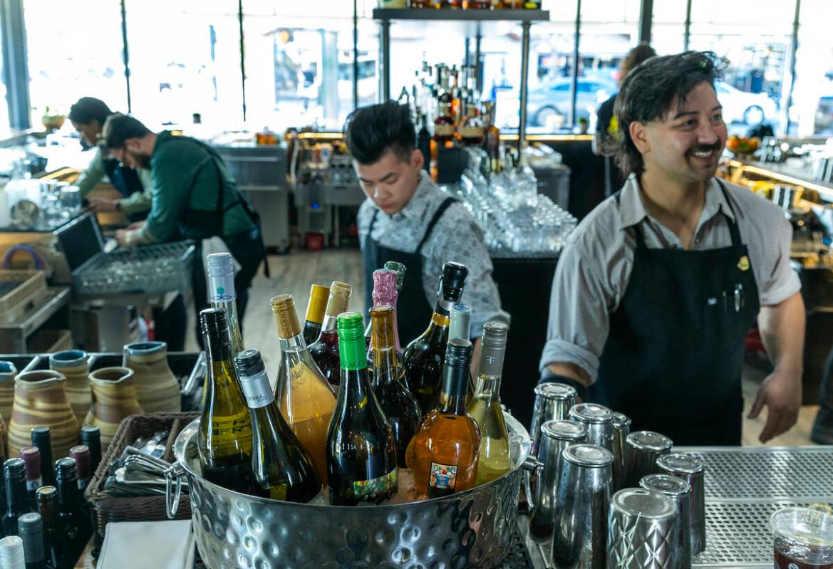 Esther's Kitchen bar staff stock up for their first guests as they prepare to reopen in their n ...