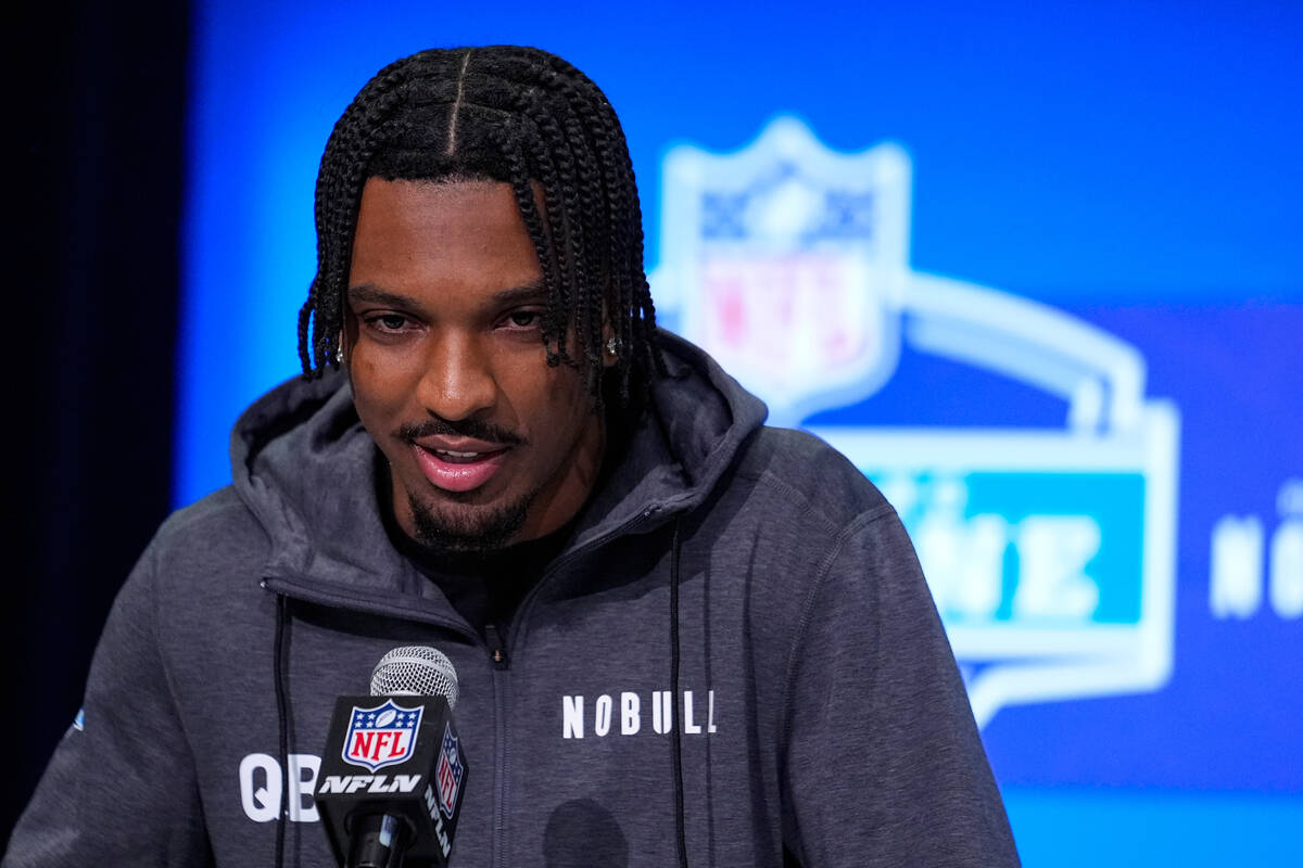 LSU quarterback Jayden Daniels speaks during a press conference at the NFL football scouting co ...