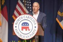 FILE - North Carolina GOP Chairman Michael Whatley speaks at the state party's convention on Ju ...