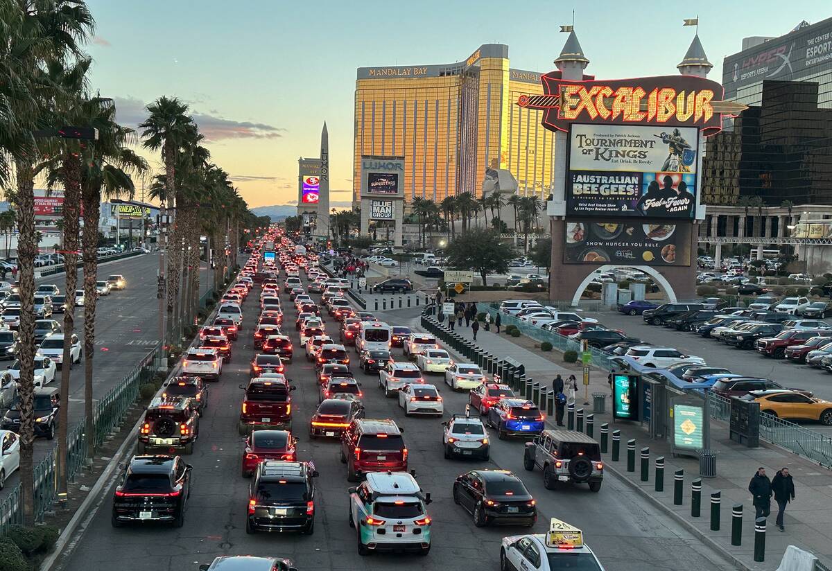 Jammed traffic on the Las Vegas Strip as seen from a pedestrian bridge on Tropicana Avenue on S ...