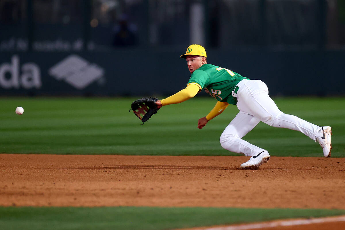 Oakland Athletics first baseman Drew Lugbauer (75) dives for the ball during a Major League Bas ...
