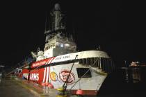 The ship belonging to the Open Arms aid group is seen docked as it prepares to ferry some 200 t ...