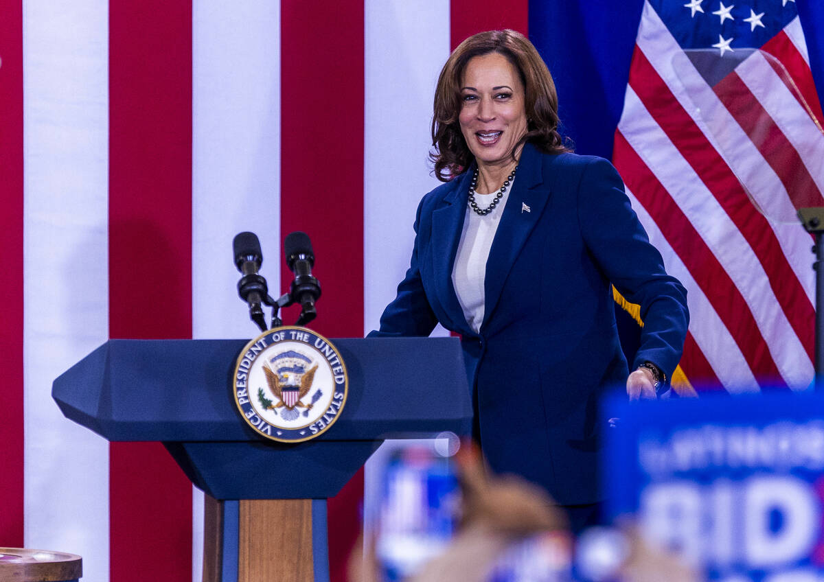 Vice President Kamala Harris arrives on stage to speak during a rally at Mojave High School on ...