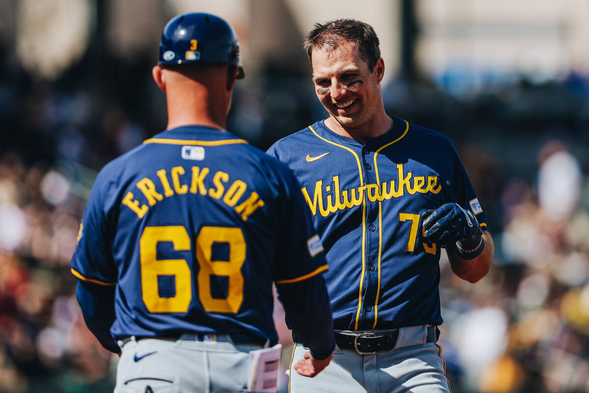 Milwaukee Brewers outfielder Brewer Hickland (75) laughs as he walks off the field during a Big ...