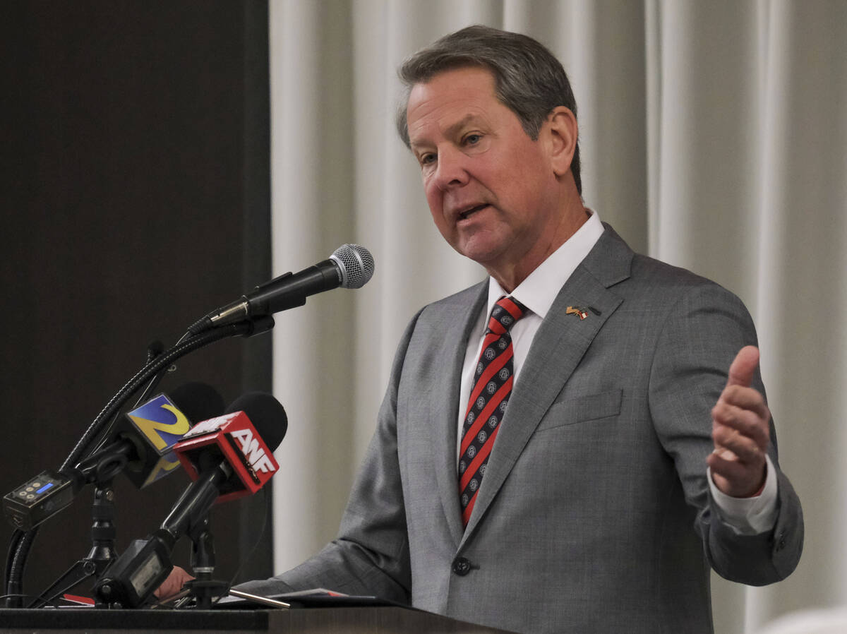 Georgia Gov. Brian Kemp speaks to the attendees at the Athens Area Chamber of Commerce's Pancak ...