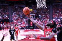 UNLV Rebels forward Keylan Boone (20) gets inside of UNR for a basket during the first half of ...