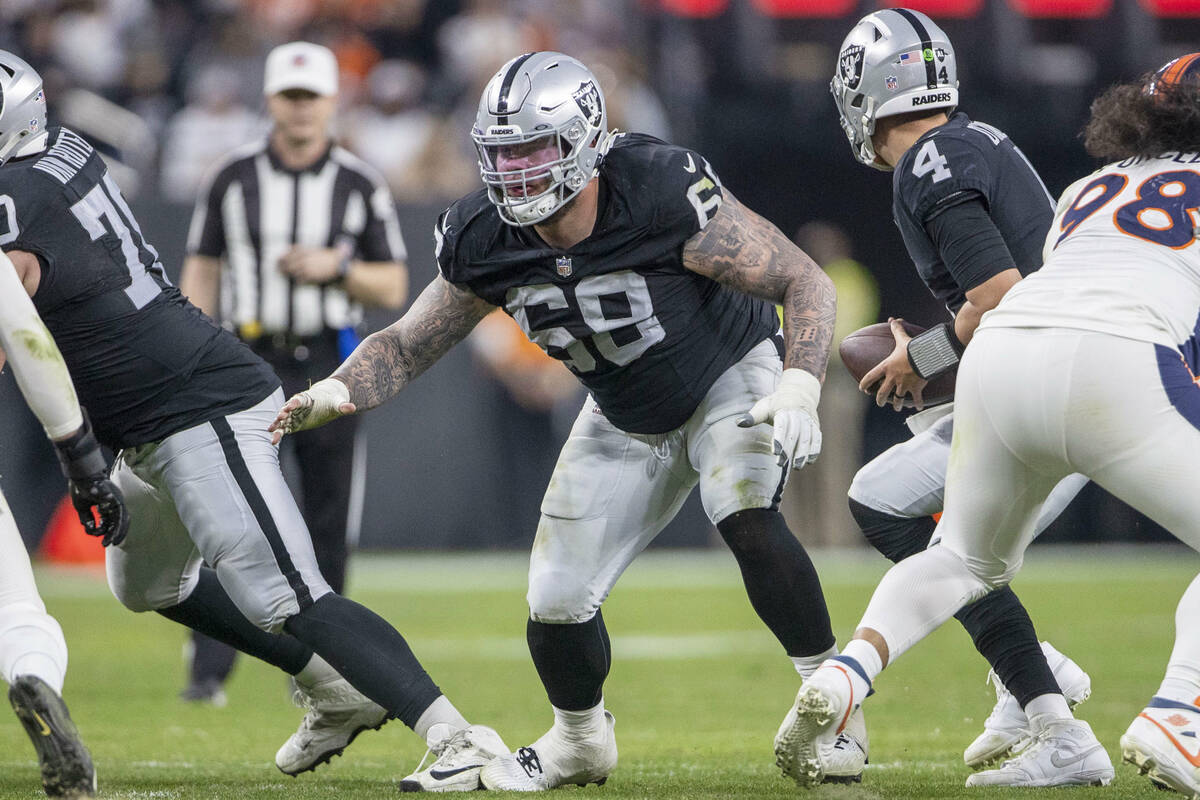 Raiders center Andre James (68) protects the pocket for quarterback Aidan O'Connell (4) during ...