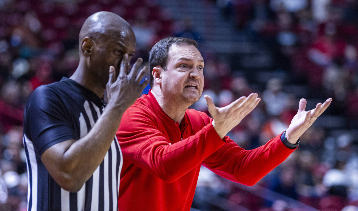 UNLV head coach Kevin Kruger makes his appeal with the refereee against the San Diego State Azt ...