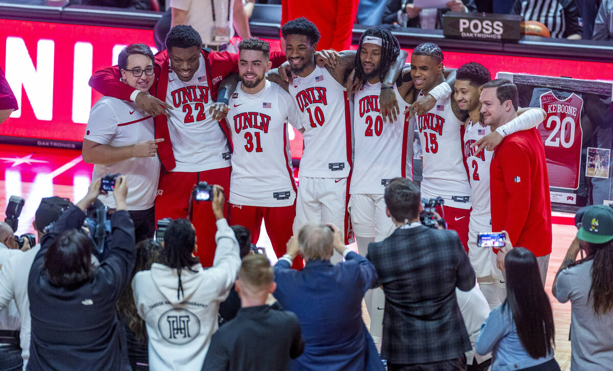 UNLV senior players gather together before the first half of their NCAA men's basketball game a ...