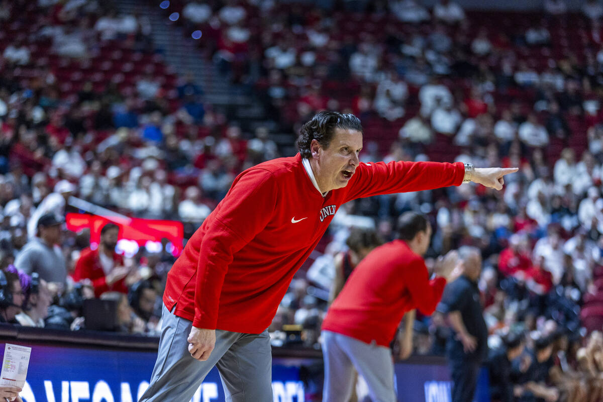 UNLV assistant coach Kevin Kruger Barret Peery directs his players against the San Diego State ...