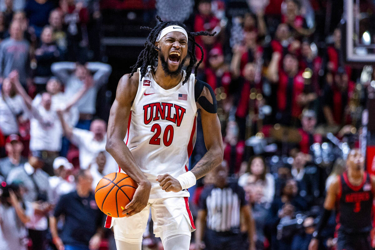 UNLV forward Keylan Boone (20) celebrates a critical turnover late in the game against the San ...