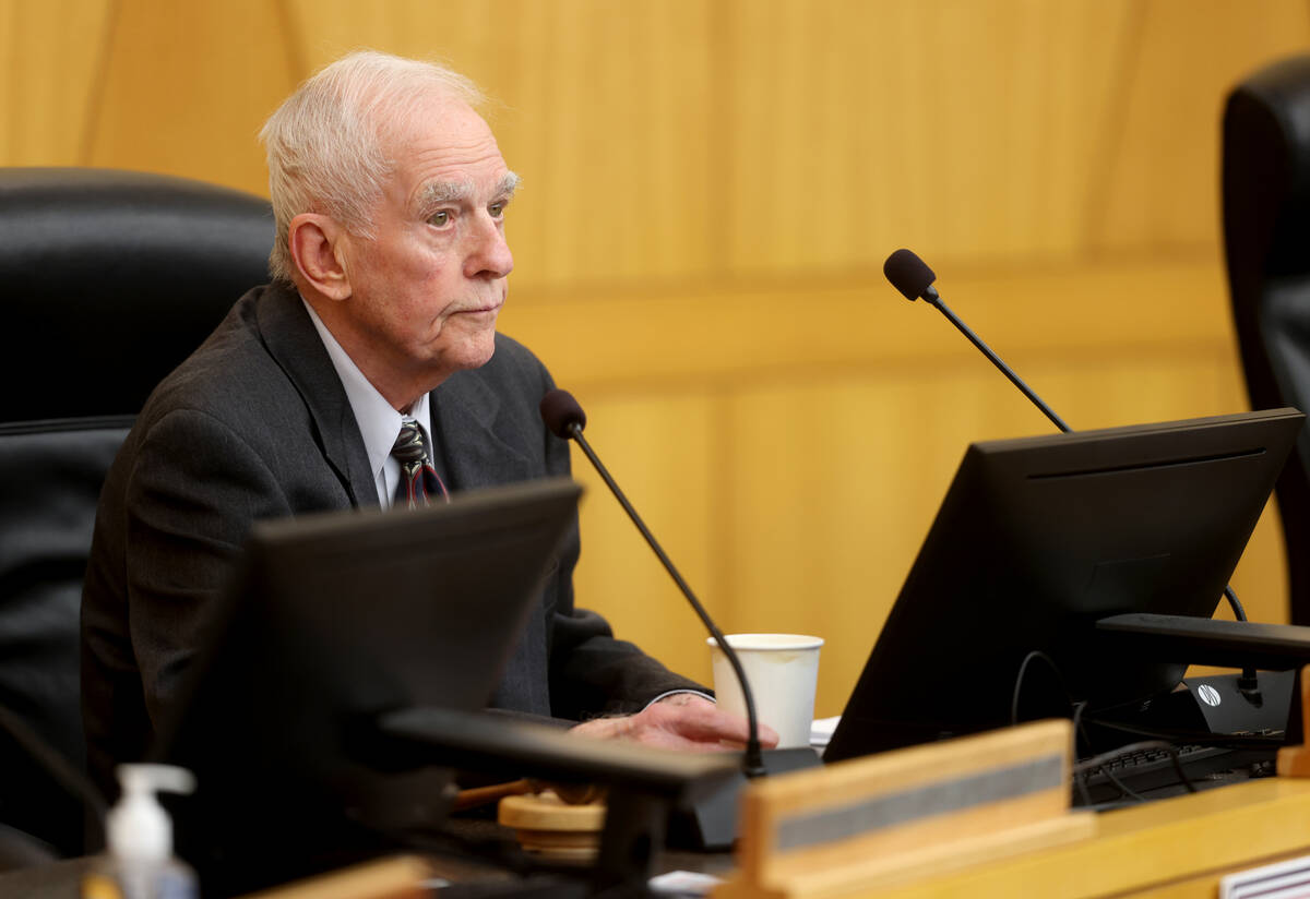Retired Las Vegas Justice of the Peace William Jansen, serving as hearing master, listens durin ...