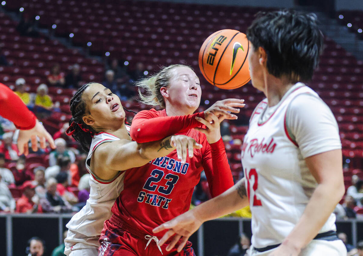 UNLV’s forward Nneka Obiazor knocks the ball from the hands of Fresno State’s for ...