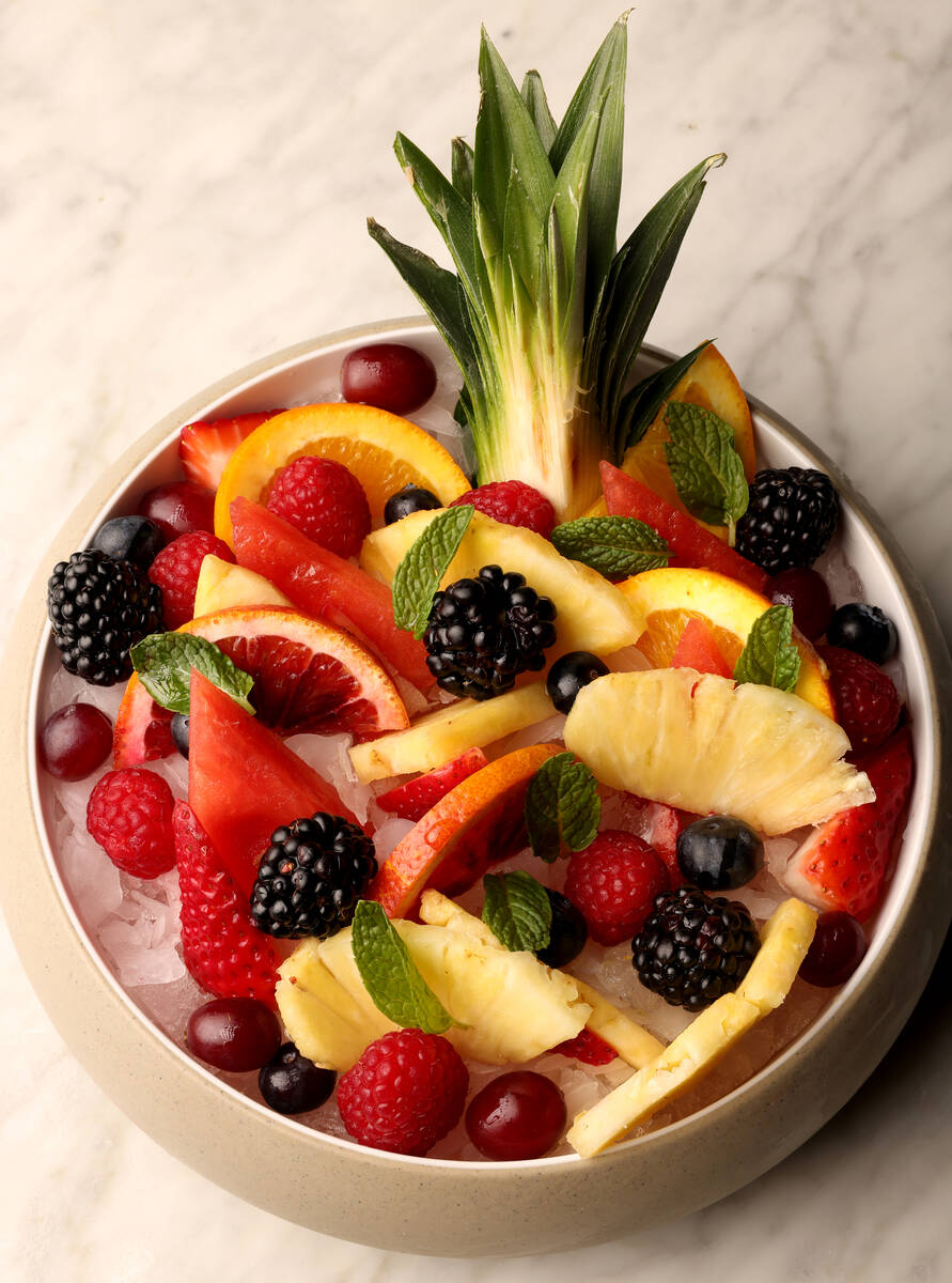 Fruit on ice is offered at Como bar and restaurant at the Bellagio pool complex in Las Vegas on ...