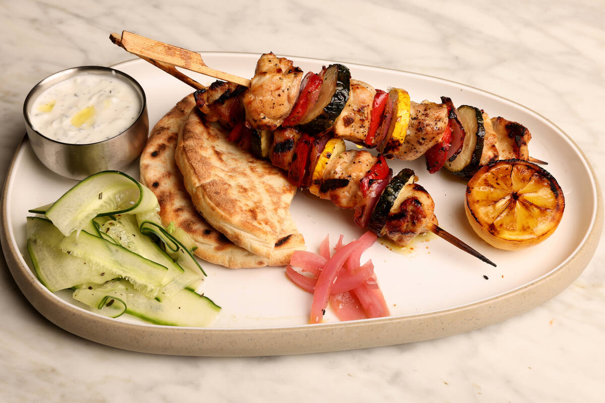 Chicken skewers are offered at Como bar and restaurant at the Bellagio pool complex in Las Vega ...