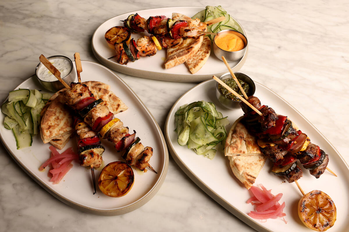Steak, chicken and shrimp skewers are offered at Como bar and restaurant at the Bellagio pool c ...