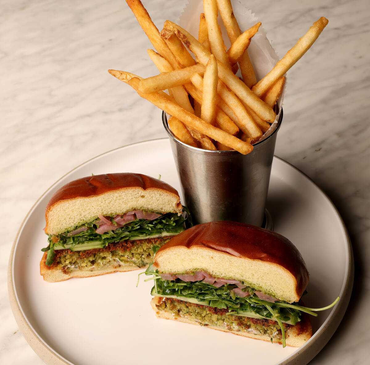 Falafel burger is offered at Como bar and restaurant at the Bellagio pool complex in Las Vegas ...