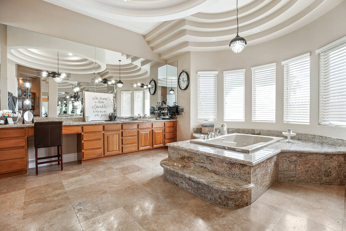 The primary bathroom has a large tub. (Luxury Estates International)