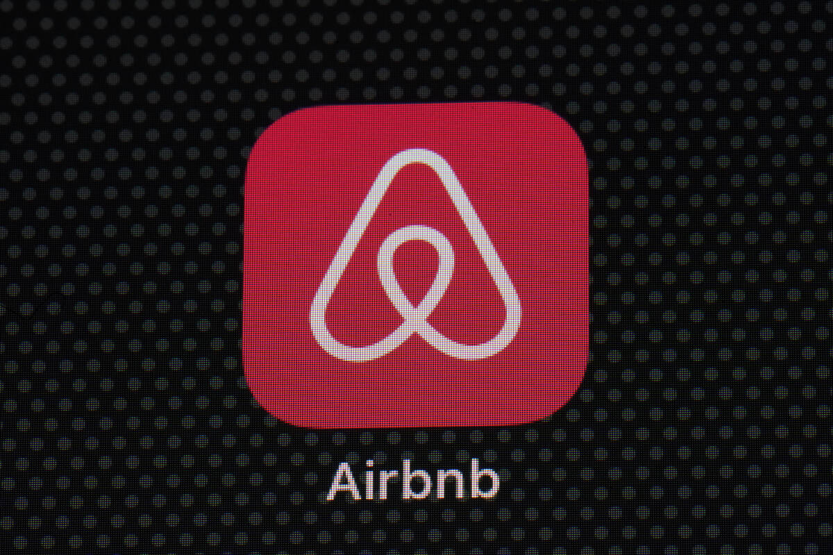 The Airbnb app icon is displayed on an iPad screen in Washington, D.C., on May 8, 2021. Airbnb ...
