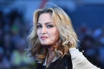 U.S. singer-songwriter Madonna poses arriving on the carpet to attend a special screening of th ...