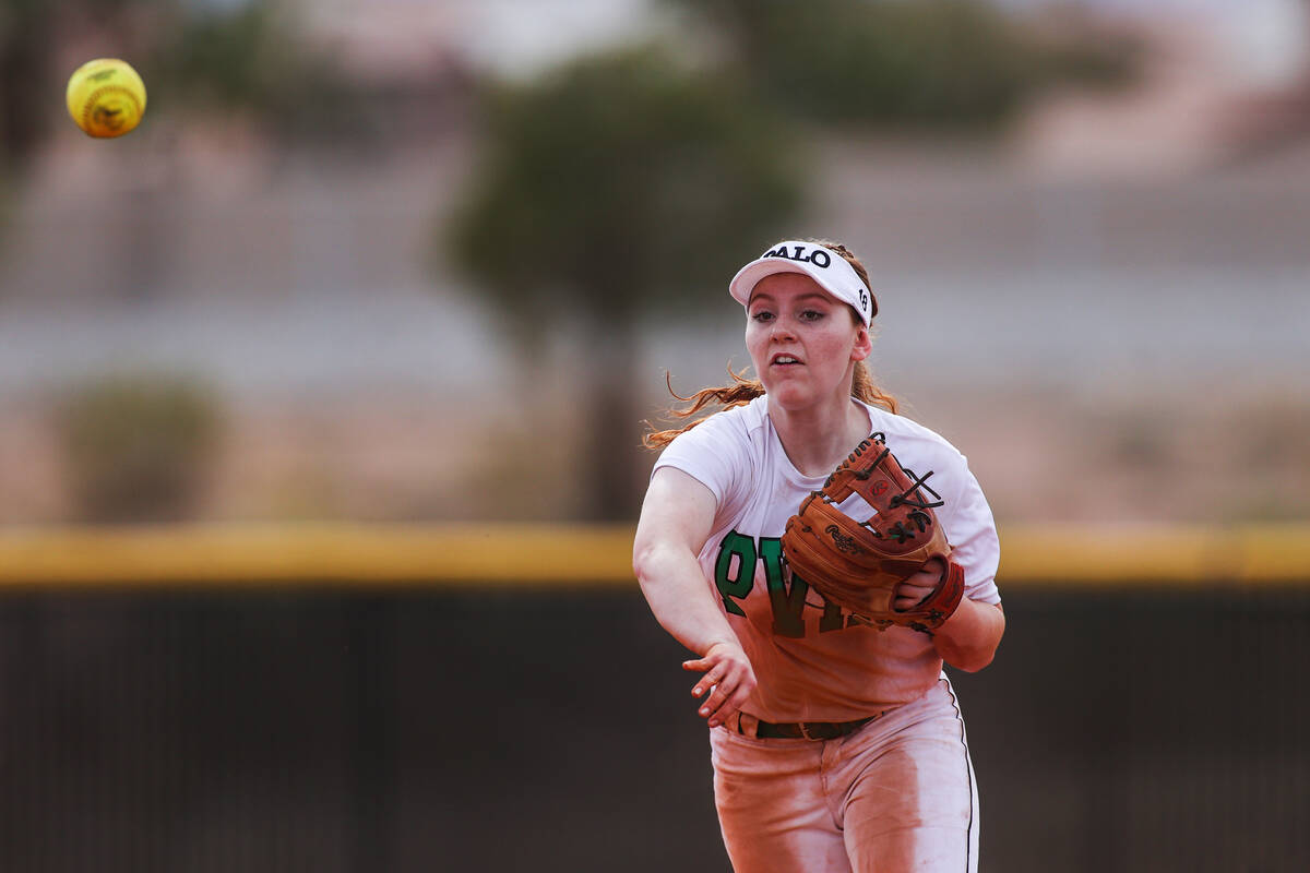 Palo Verde’s Mya Bartlett (18) makes a throw to first during a girls high school softbal ...