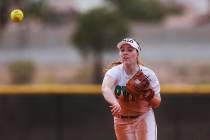 Palo Verde’s Mya Bartlett (18) makes a throw to first during a girls high school softbal ...