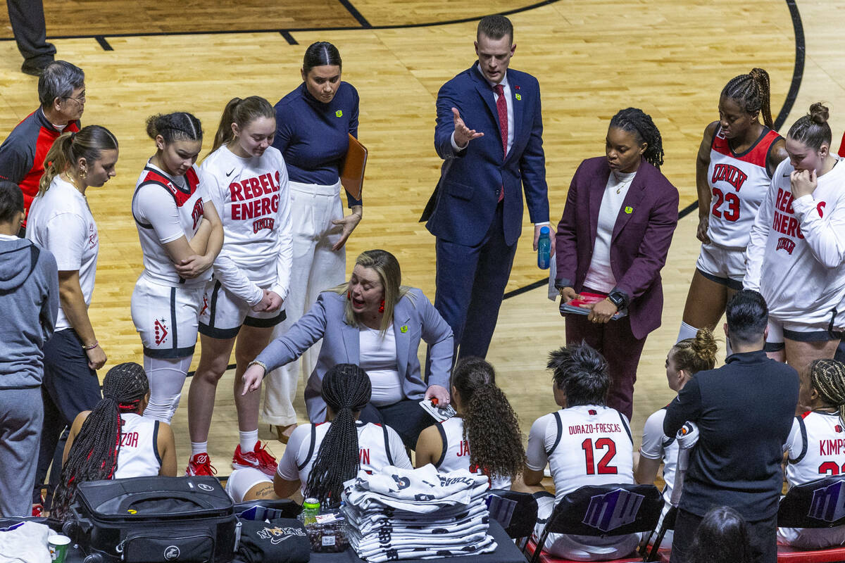 UNLV Lady Rebels head coach Lindy La Rocque counsels her players on a timeout against the Color ...