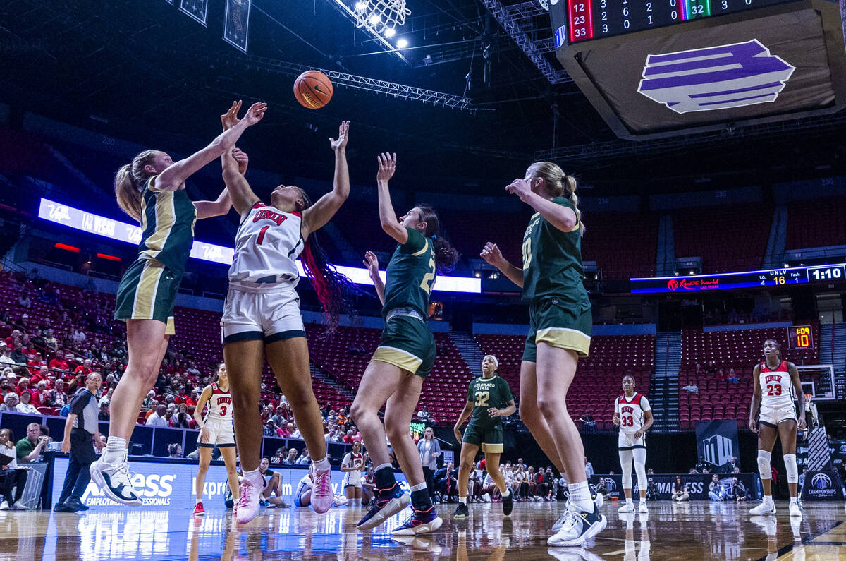 Colorado State Rams guard Sanna Strom (20) pokes away a rebound while fouling UNLV Lady Rebels ...