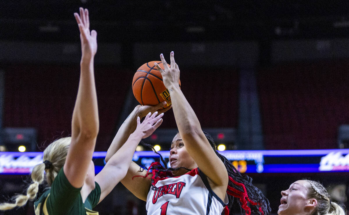 UNLV Lady Rebels forward Nneka Obiazor (1) posts up for a shot over Colorado State Rams guard S ...