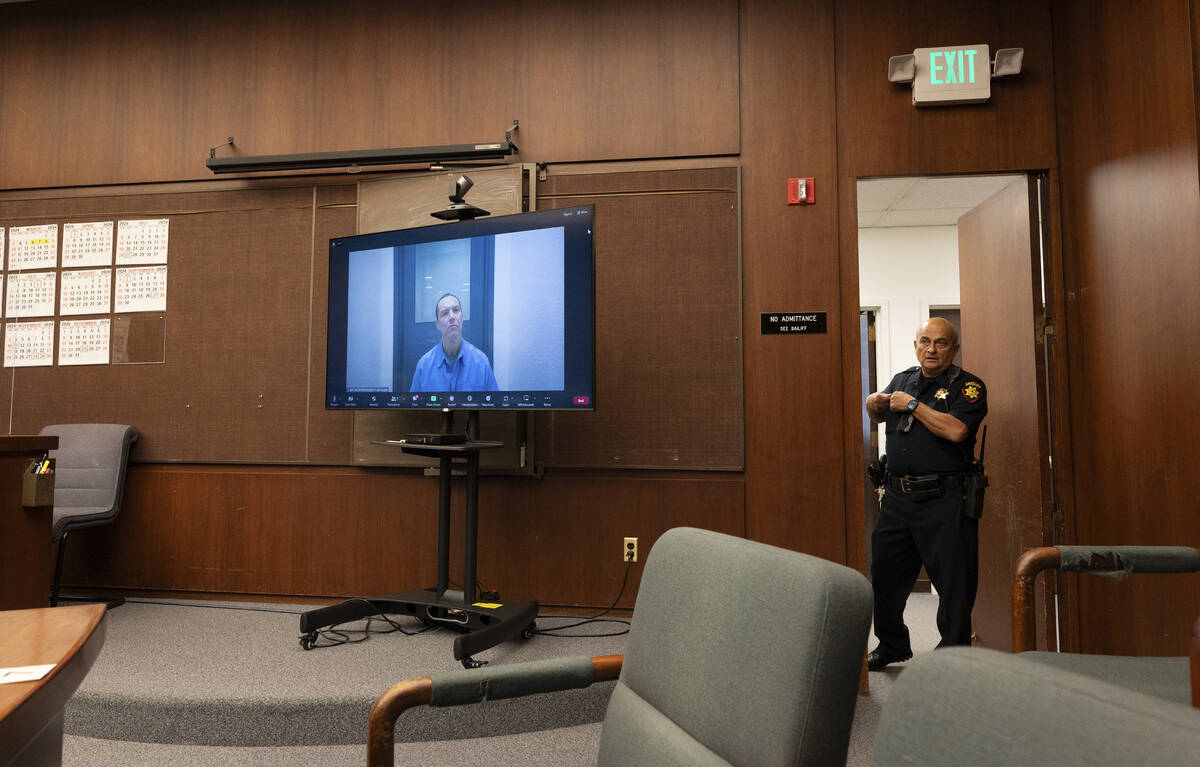 Scott Peterson appears on a video call from Mule Creek State Prison during a status conference ...
