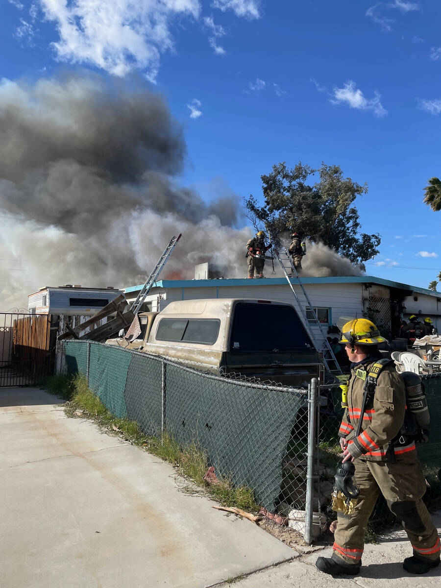 Crews battle a residential fire Wednesday, March 13, 2024, on the 900 block of De Mat Drive, ne ...