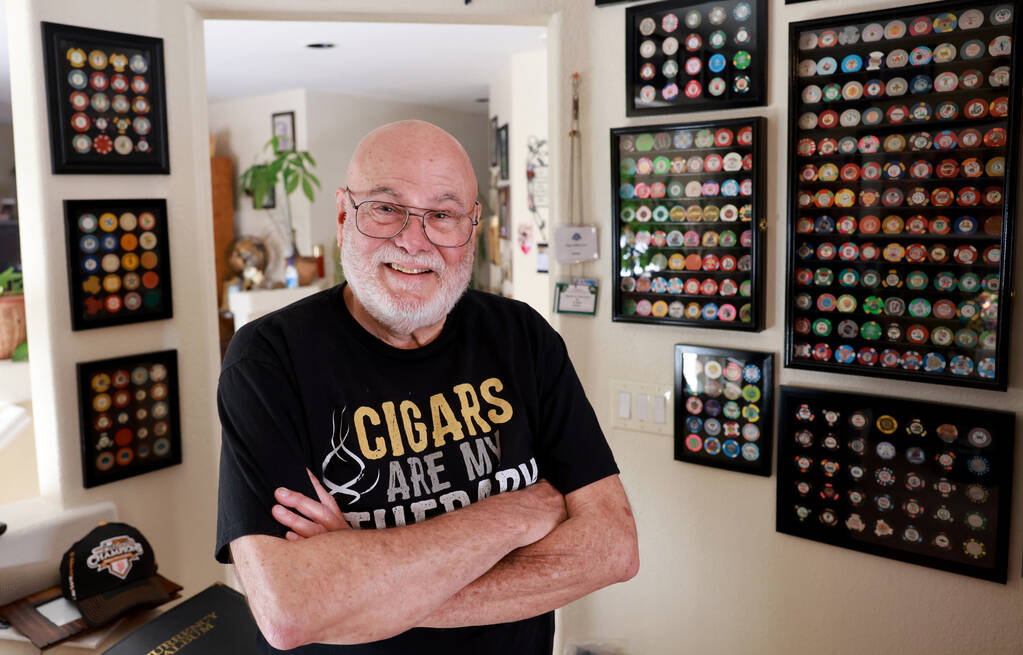 Rigo Villarnovo, 77, with his collection casino chips at his Las Vegas home Wednesday, March 13 ...
