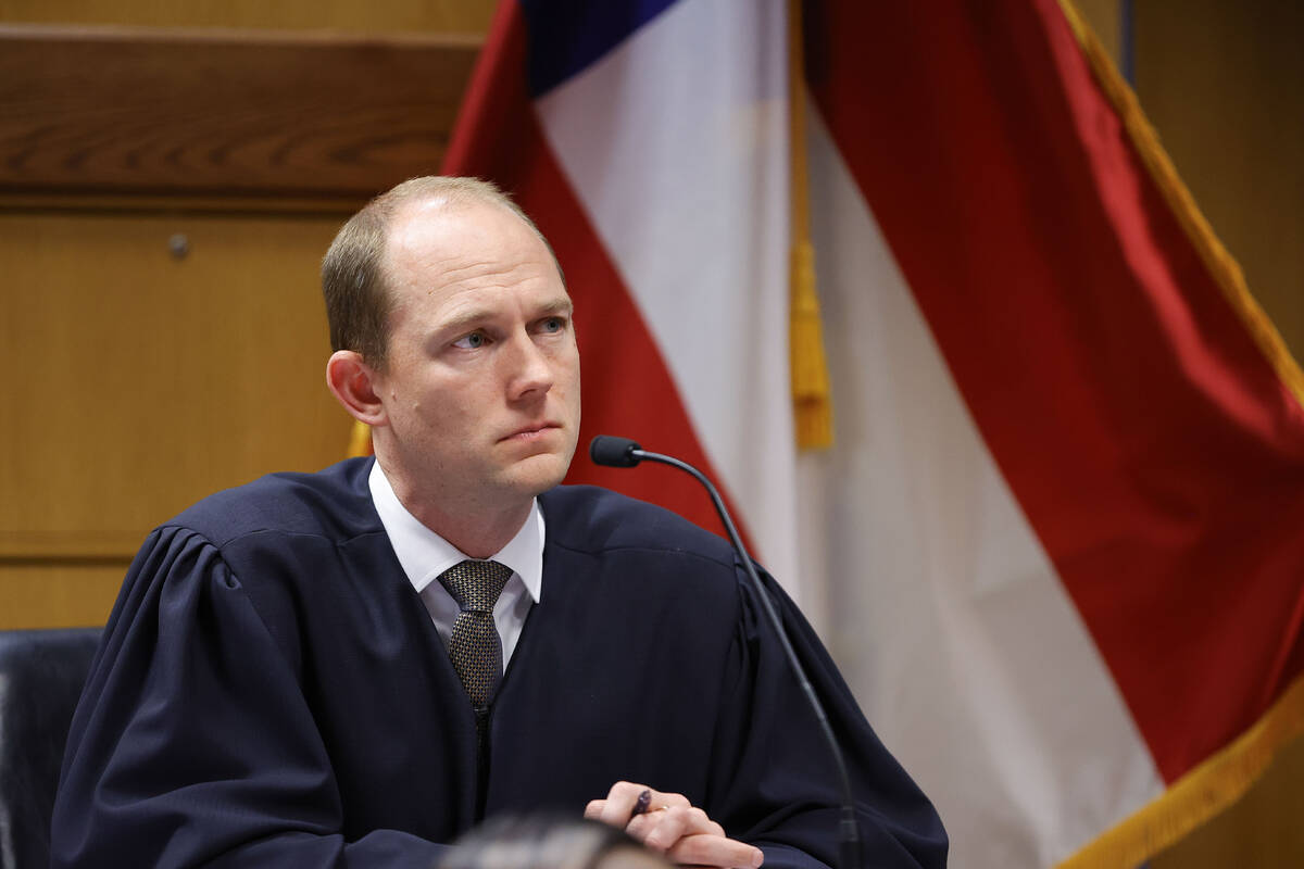 Fulton County Superior Judge Scott McAfee presides in court, Friday, March, 1, 2024, in Atlanta ...