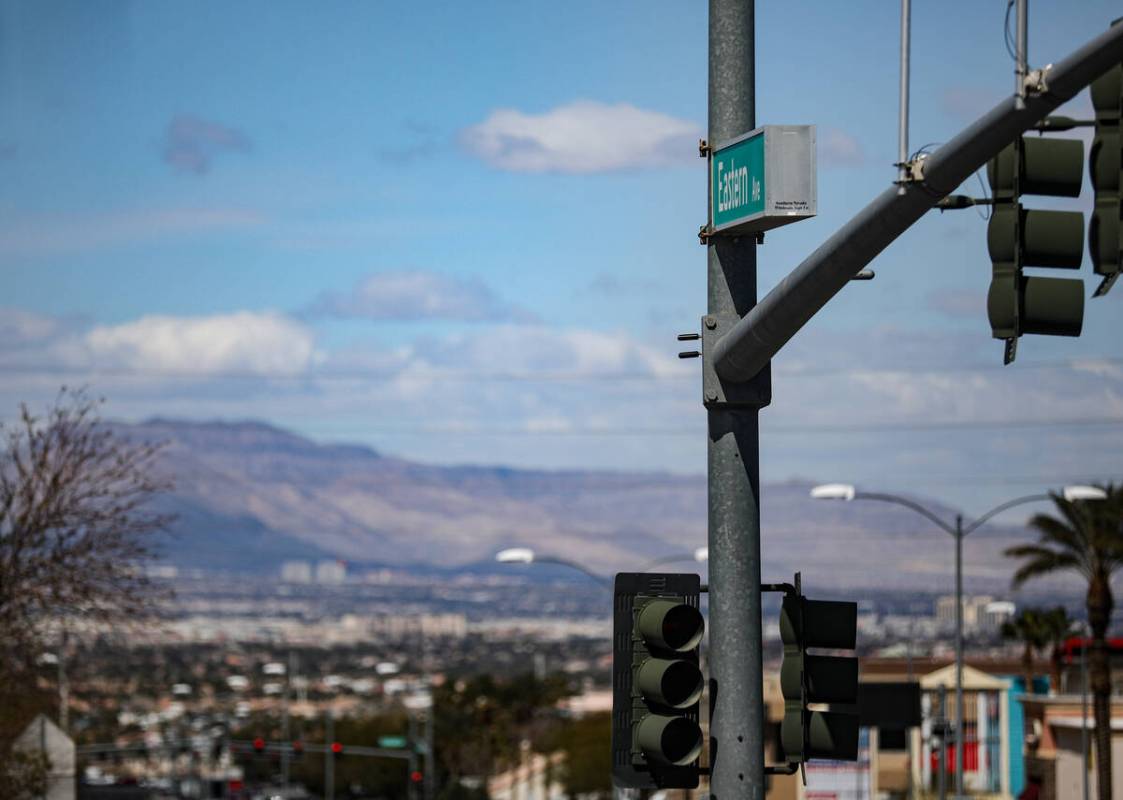Red light indicators on a street light pole at the intersection of Eastern Avenue and Horizon R ...