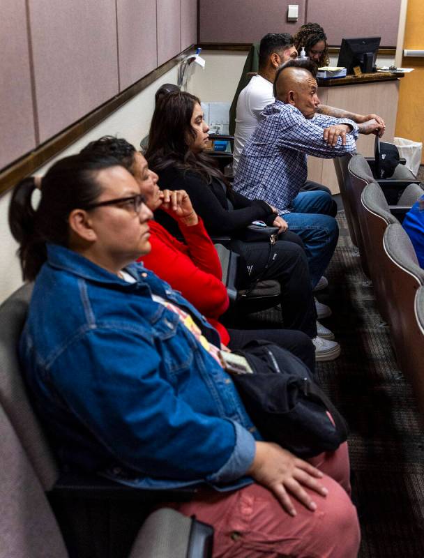Family members listen to proceedings during a sentencing hearing for one of the juveniles invol ...