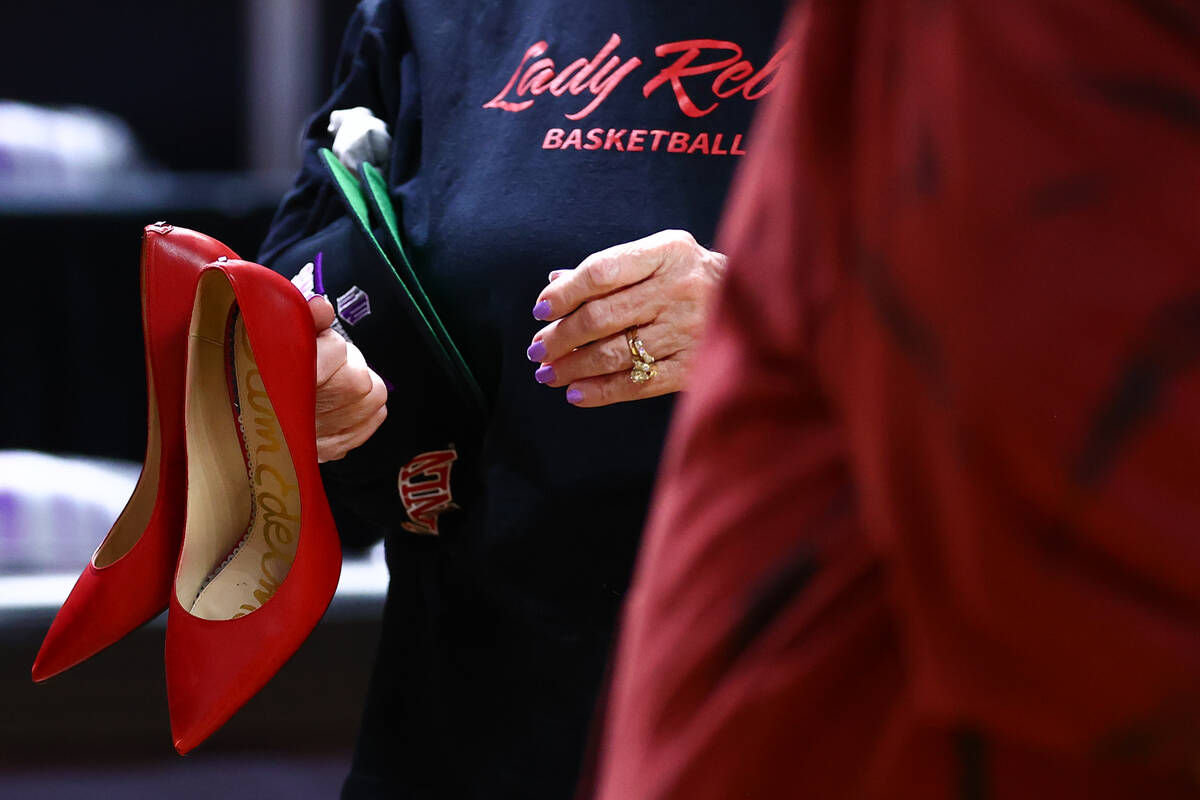 Beverly La Rocque, mother of UNLV Lady Rebels head coach Lindy La Rocque, holds her daughter&#x ...