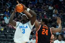 UCLA forward Adem Bona (3) attempts a shot against Oregon State center KC Ibekwe (24) during th ...