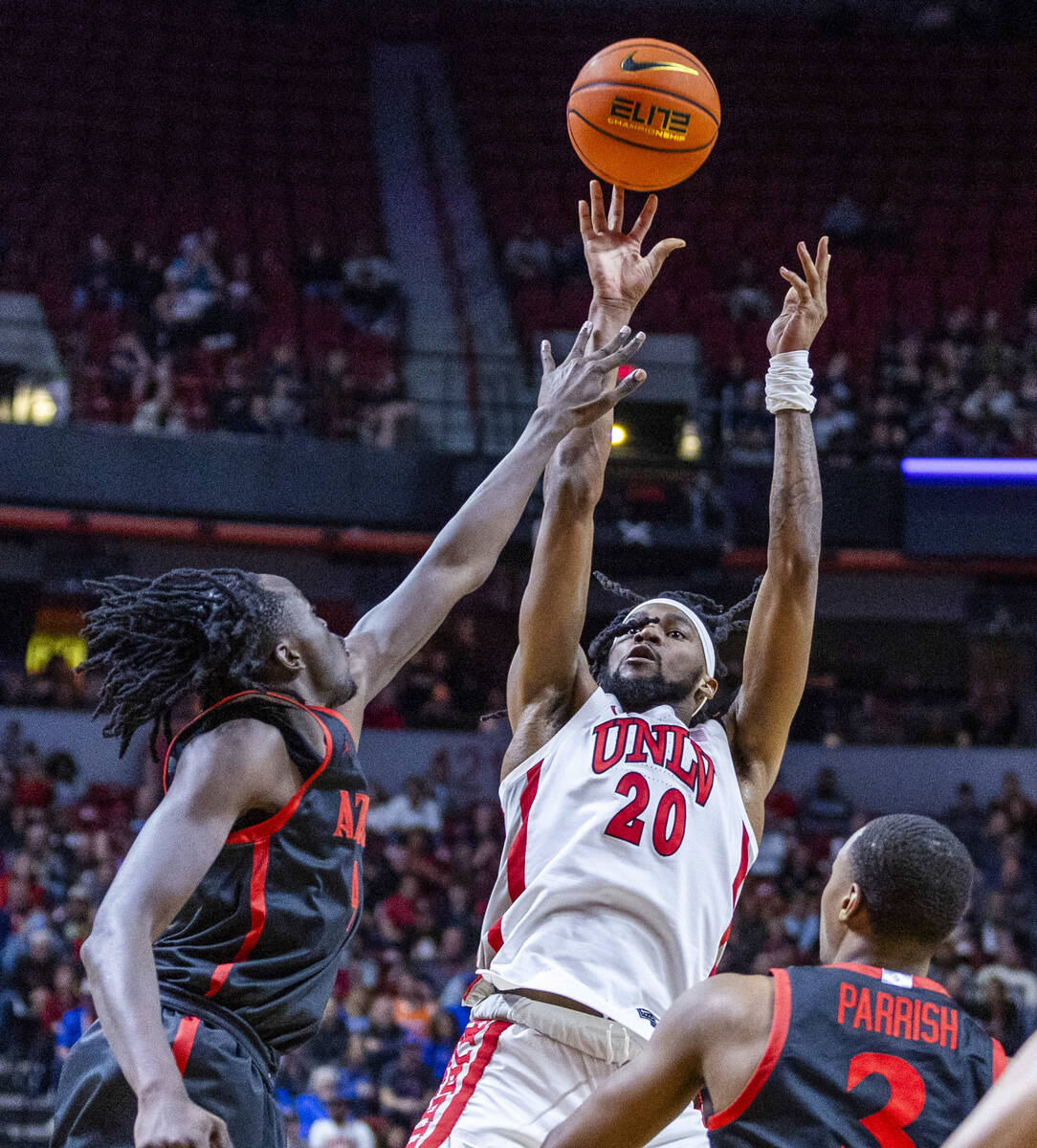 UNLV Rebels forward Keylan Boone (20) elevates for a shot over San Diego State Aztecs forward J ...