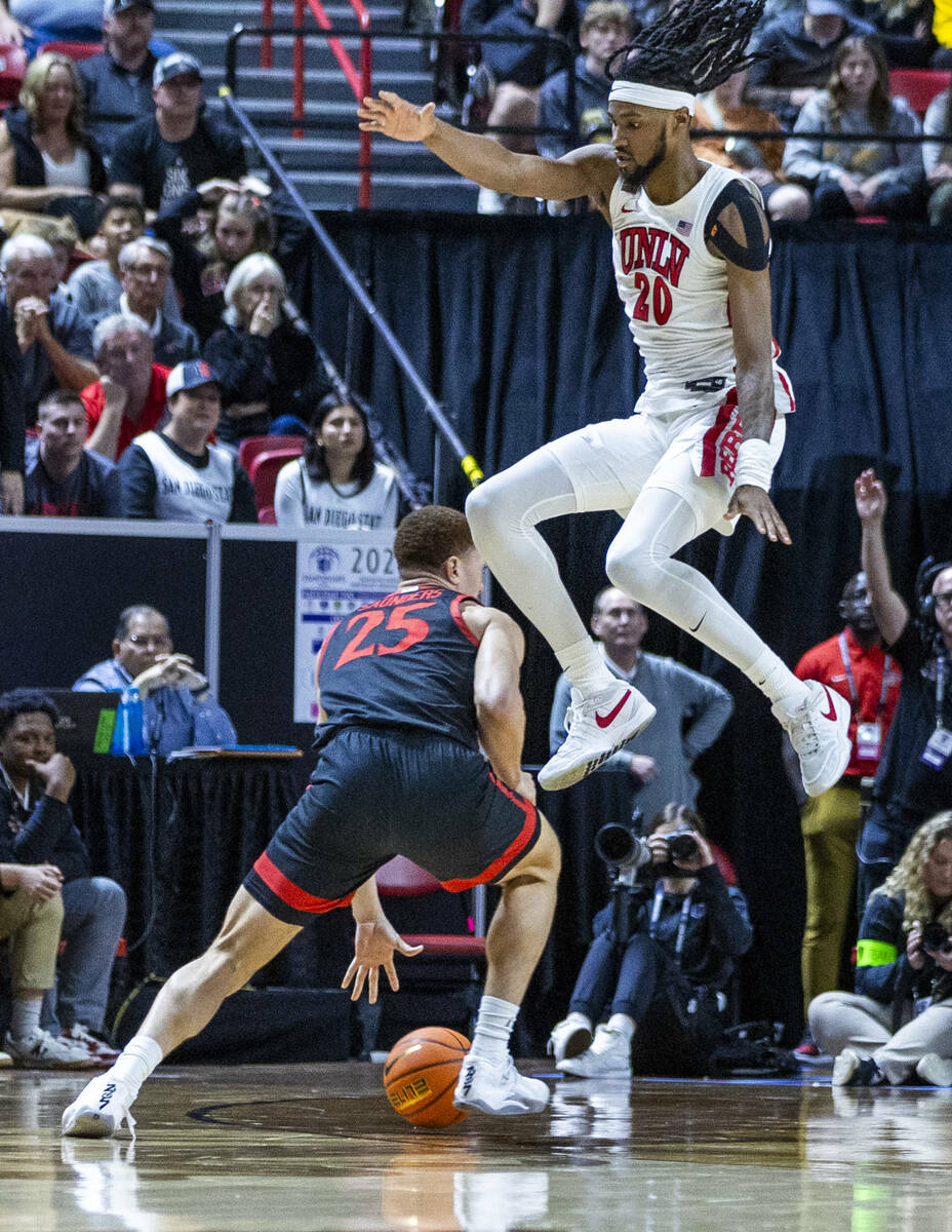 UNLV Rebels forward Keylan Boone (20) goes up thinking blocked shot as San Diego State Aztecs f ...