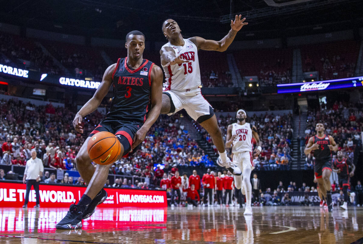San Diego State Aztecs guard Micah Parrish (3) is able to slap the ball away on a drive from UN ...