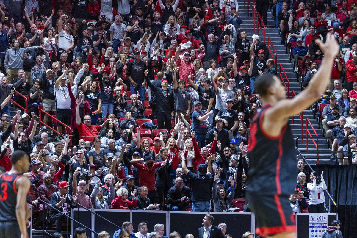 Fans get excited as San Diego State Aztecs forward Jaedon LeDee (13) scores again against the U ...