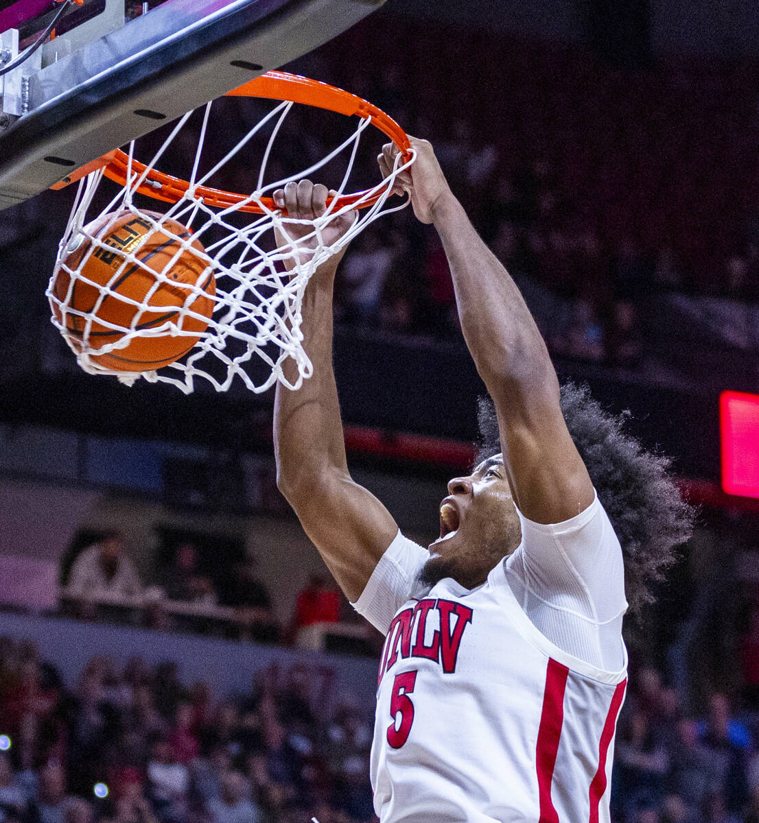 UNLV Rebels forward Rob Whaley Jr. (5) breaks free for a dunk against the San Diego State Aztec ...