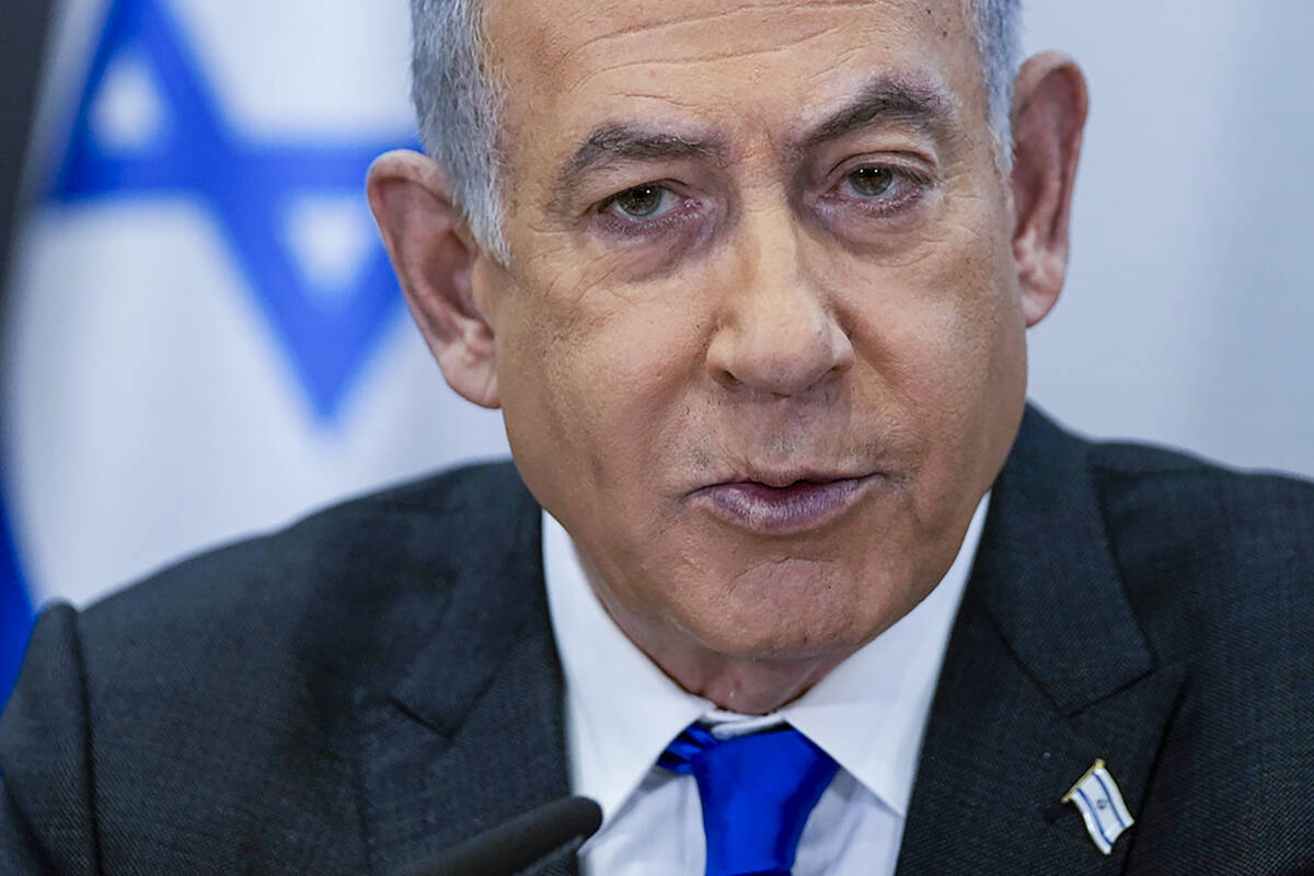 Israeli Prime Minister Benjamin Netanyahu chairs a cabinet meeting at the Kirya military base, ...