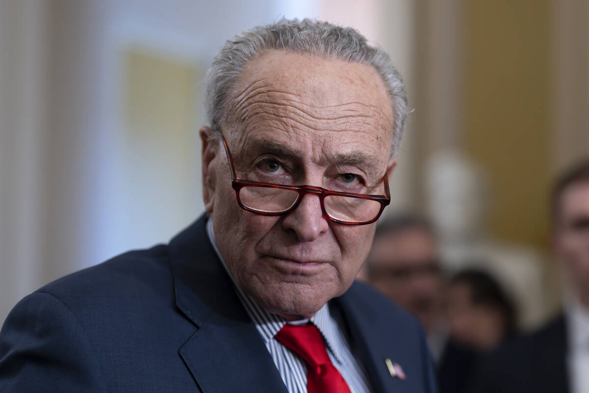 Senate Majority Leader Chuck Schumer, D-N.Y., speaks to reporters at the Capitol in Washington, ...
